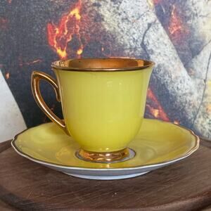 Vintage Rudolph kampf CzechoSlovakia gold tone and yellow cup and saucer set